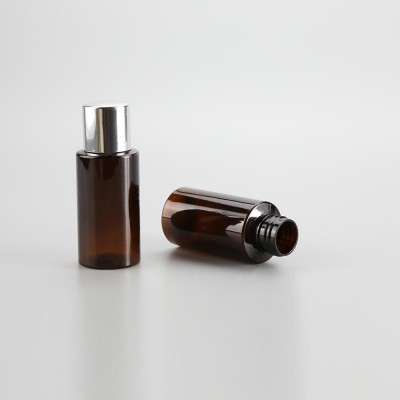 Fancy 50ml amber cylinder round cosmetic plastic toner lotion shampoo packaging bottle with high quality silver screw cap